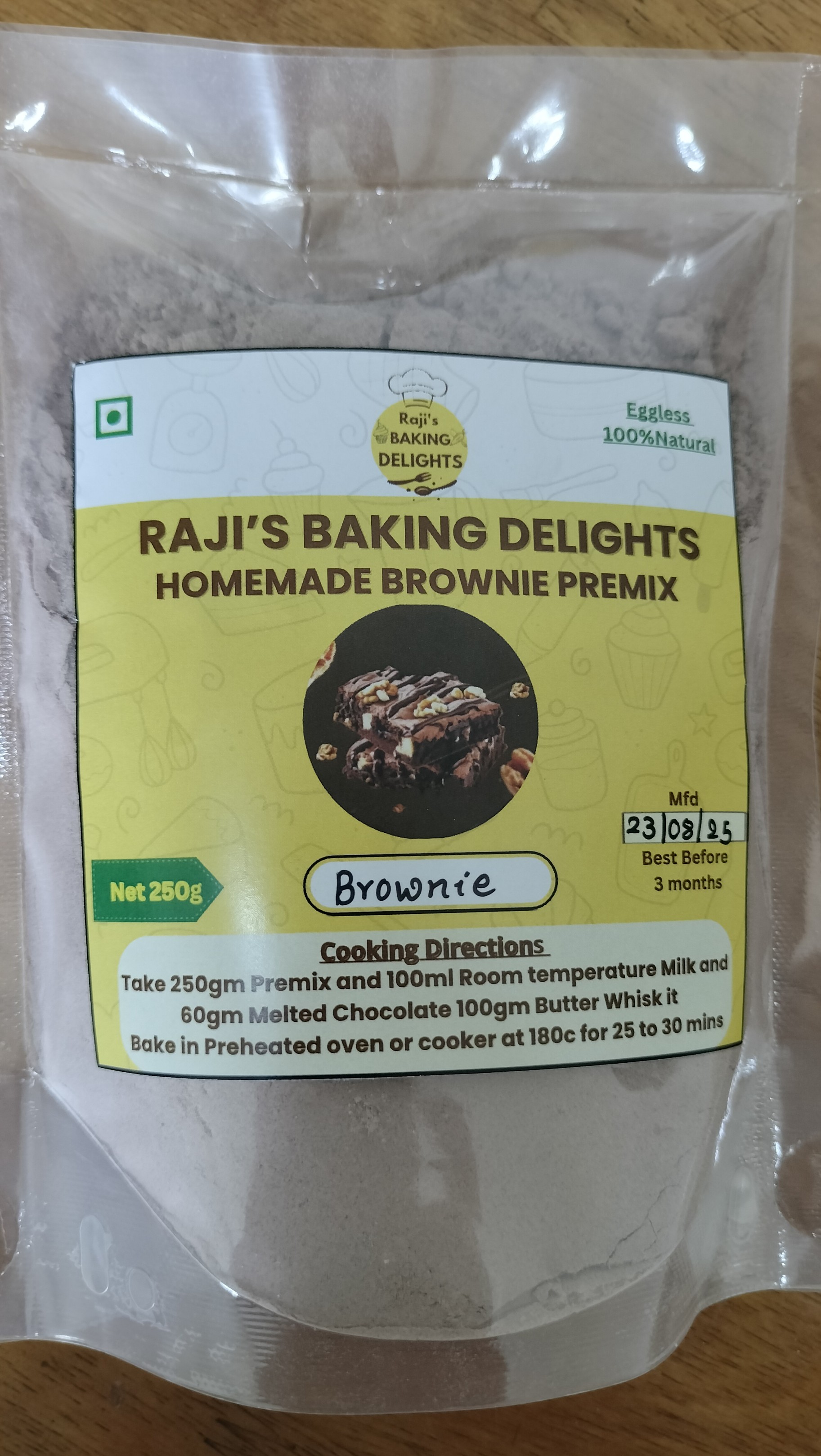 Homemade Brownie Premix – 250g Handmade • Eggless • 100% Natural Description Delicious fudgy brownies in minutes! This ready-to-use premix is freshly handmade after order, completely eggless, natural, and free from harmful chemicals. Perfect for kids, parties, and gifting. How to Use (250g pack) Mix: 250g premix + 100ml milk + 60g melted chocolate + 100g butter Bake: Preheated oven @180°C for 25–30 mins (or cooker 30–35 mins) Cool & cut into 8–10 brownie squares Storage & Shelf Life Store in a cool, dry place Once opened, keep in an airtight container Best before 3 months from MFD Baked brownies stay: 2 days at room temp | 5–6 days refrigerated | 1 month frozen